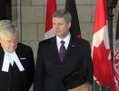 Le président afghan, Hamid Karzai, avec le premier ministre canadien, Stephen Harper（攝影:  / 大紀元）  