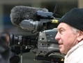 Le cinéaste Peter Rowe pendant le tournage de son documentaire Beyond the Red Wall（攝影:  / 大紀元）  
