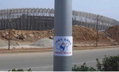Logo du Relais de la flamme des droits de l’Homme en Chine placardé au centre sportif olympique de Jinan.（攝影:  / 大紀元）  