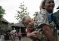 Réfugiés birmans dans le camp de Mae La en Thaïlande.（Staff: PORNCHAI KITTIWONGSAKUL / 2007 AFP）  