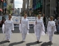 Des déesses du Relais mondial de la Flamme des droits de l’Homme à Montréal,（攝影:  / 大紀元）  