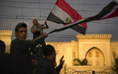 Vague de drapeaux égyptiens lors d’une manifestation devant le palais présidentiel au Caire le 11 février 2011. (Pedro Ugarte/AFP/GettyImages) 