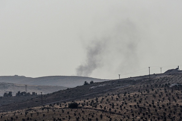  
Les forces turques ont échangé dimanche des tirs avec des jihadistes de l'ex-branche d'Al-Qaïda en Syrie à la frontière de la province d'Idleb, au lendemain de l'annonce par Ankara d'une prochaine opération dans cette zone.
(ILYAS AKENGIN/AFP/Getty Images)