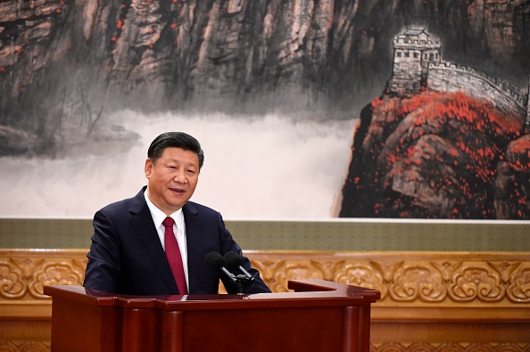  Le président Xi Jinping a été officiellement renommé chef du Parti communiste Parti le 25 octobre, commandant un nouveau conseil dirigeant dont le rôle sera probablement éclipsé après qu'il se soit établi comme le chef le plus puissant de la Chine depuis des décennies. (WANG ZHAO / AFP / Getty Images)