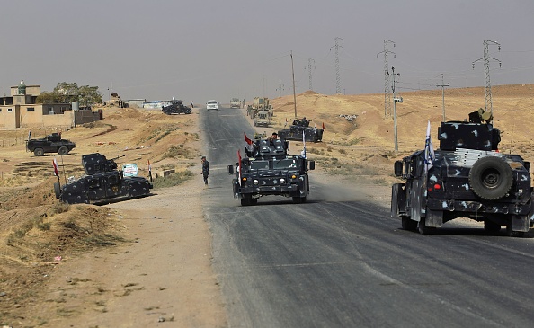 Les forces de sécurité irakiennes avançant le 26 octobre 2017 vers la ville de Faysh Khabour, qui est située sur les frontières turques et syriennes dans la région autonome kurde irakienne.
(AHMAD AL-RUBAYE / AFP / Getty Images)