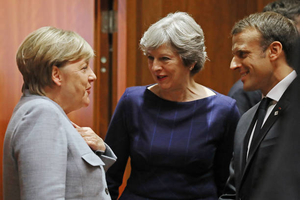 Angela Merkel, Theresa May et Emmanuel Macron le 19 octobre 2017 à Bruxelles avant une table ronde sur le Brexit, la Corée du Nord et l’accord sur le nucléaire iranien. (Dan Kitwood/Getty Images)