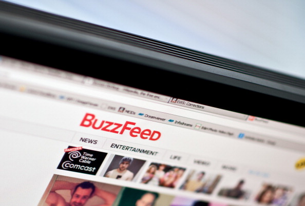   Le logo du site d'information BuzzFeed est vu sur un écran d'ordinateur.  
 Photo NICHOLAS KAMM/AFP/Getty Images)