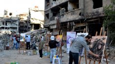 En Syrie, la peinture pour exorciser la guerre dans le camp de Yarmouk
