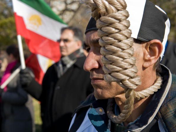 Protestations de condamnation à mort. Photo : NICHOLAS KAMM / AFP / Getty Images.