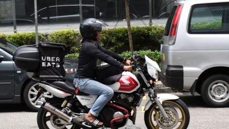 Singapour: Uber et Grab mis à l’amende après leur fusion