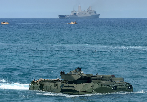  -Les manœuvres militaires entre la Chine et l’Asean doivent aider à "bâtir de la confiance". Photo TED ALJIBE/AFP/Getty Images. 