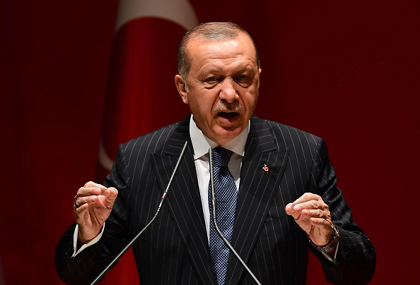 -Recep Tayyip Erdogan, président de la Turquie dit : « Nous allons détruire la structure terroriste à l'est de l'Euphrate. ».  Photo ADEM ALTAN / AFP / Getty Images.
