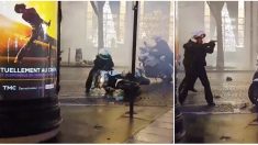 Manifestation du 22 décembre : acculé sur les Champs-Élysées, un policier sort son arme et met en joue les manifestants