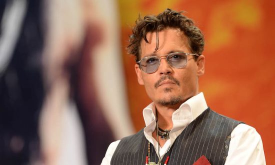 Johnny Depp le 17 juillet 2013 à Tokyo au Japon. Johnny Depp a été retiré de la franchise Pirates Of the Caribbean. (Atsushi Tomura/Getty Images)