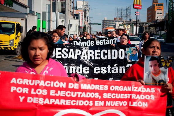 -Des personnes manifestent pour protester contre les proches de leurs proches disparus à Monterrey, au Mexique, le 31 janvier 2018. La Commission internationale pour les personnes disparues apporte son soutien au gouvernement et aux organisations locales. Photo JULIO CESAR AGUILAR / AFP / Getty Images