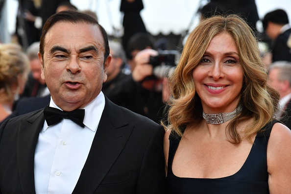 -Une photo prise avant l’arrestation de Carlos Ghosn, nous le voyions avec son épouse Carole Ghosn, à la 71e édition du Festival de Cannes, sud de la France. Photo par Alberto PIZZOLI / AFP / Getty Images.
