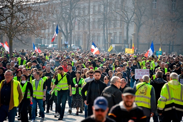 Des Gilets jaunes manifestent à Paris le 23 mars 2019. Crédit : JEAN-CHRISTOPHE VERHAEGEN/AFP/Getty Images.