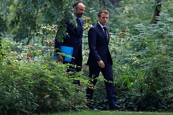 Édouard Philippe et Emmanuel Macron.(Photo : CHRISTIAN HARTMANN/POOL/AFP via Getty Images)