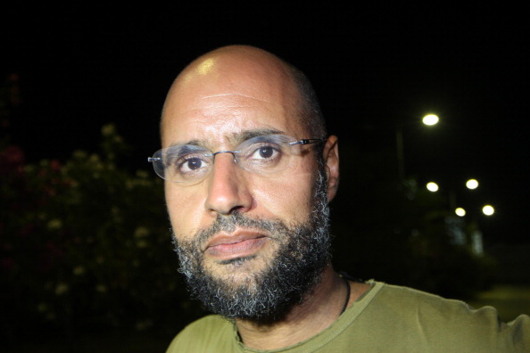 Le fils de l'ex-dictateur Kadhafi, candidat à la présidentielle en Libye,   est recherché pour "crimes contre l'humanité". (Photo : IMED LAMLOUM/AFP via Getty Images)