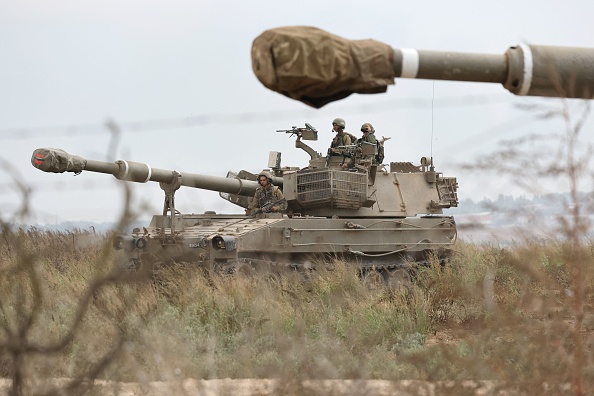Des soldats de l'armée israélienne près de la frontière avec la bande de Gaza, le 9 octobre 2023. (Photo JACK GUEZ/AFP via Getty Images)