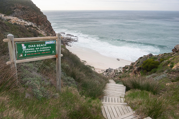 La plage de Dias, dans la réserve de Cape Point, d'où Medhi Narjissi, joueur de l'équipe de France, de 17 ans, a disparu en mer, le 08 août 2024. (RODGER BOSCH/AFP via Getty Images)